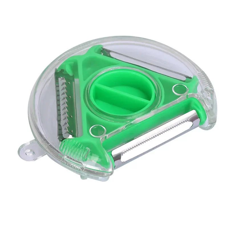 Green rotary vegetable peeler with stainless steel blades and clear protective housing