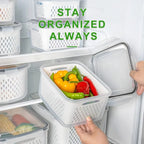 Clear refrigerator produce storage container with removable perforated drain basket