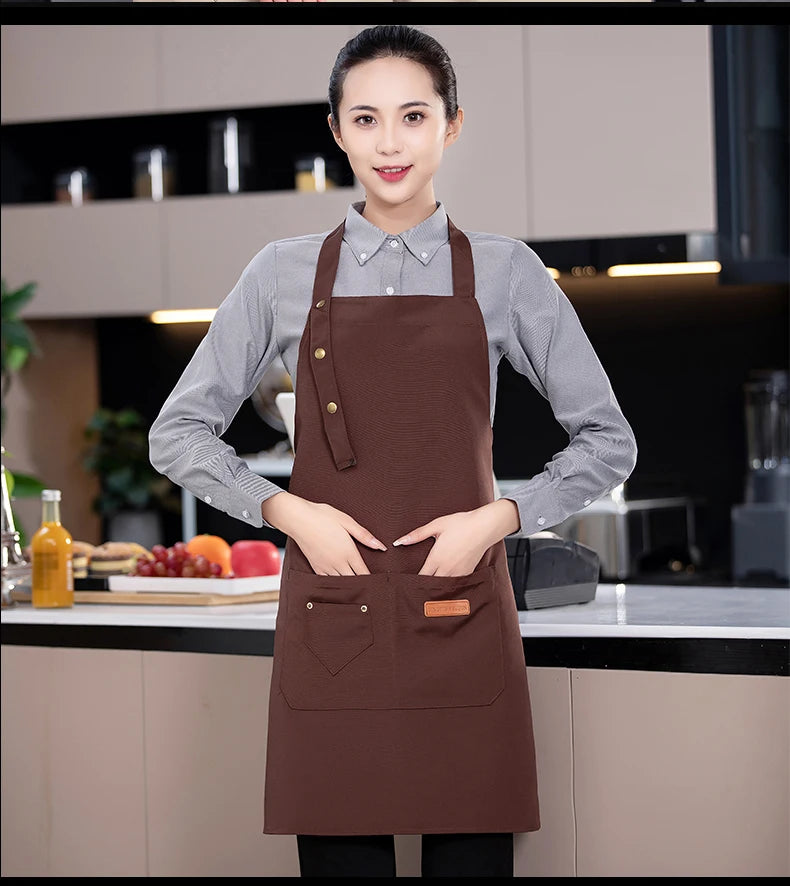 Brown canvas chef apron with adjustable neck strap and large front pocket