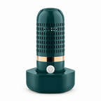 Portable wireless produce purifier, teal base with vented cylinder and power button
