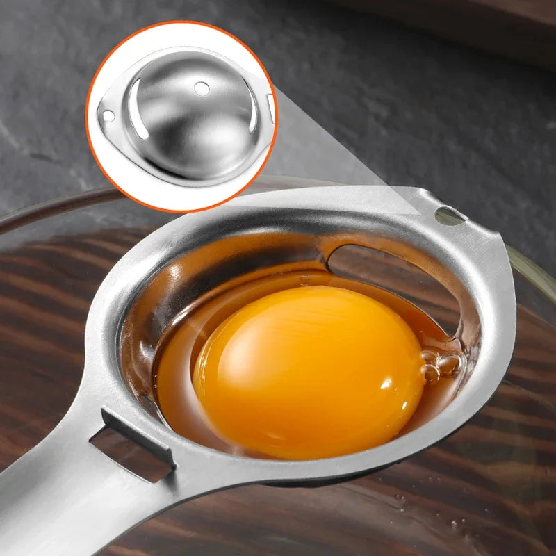 Stainless steel egg separator close-up with yolk cup and bowl rest hook