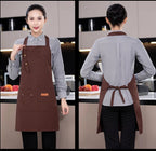 Brown canvas chef apron shown front and back with neck tie and large pocket