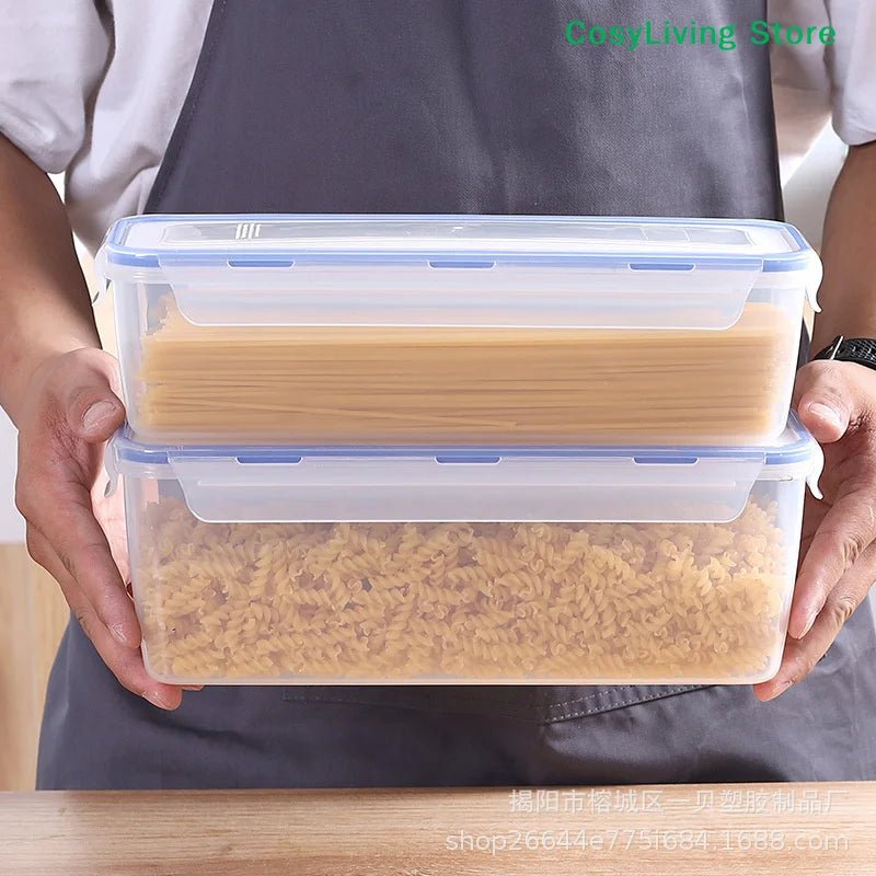 Clear bread storage box with blue lid and airtight seal, held by hands