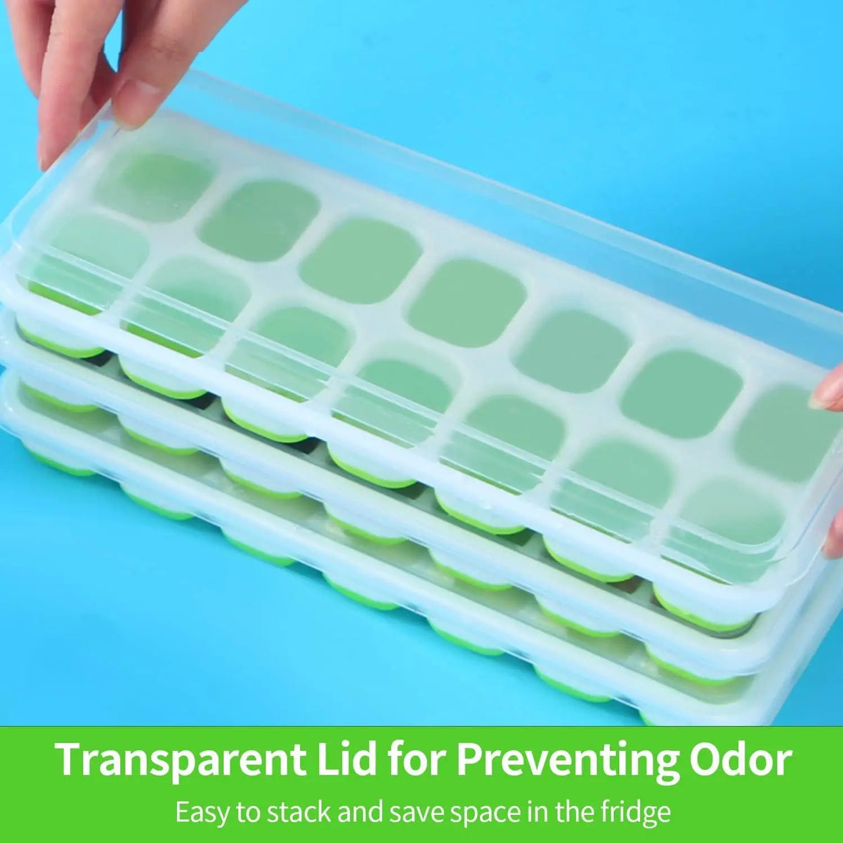 Sky blue silicone ice tray with transparent lid and mint-green cubes inside compartments