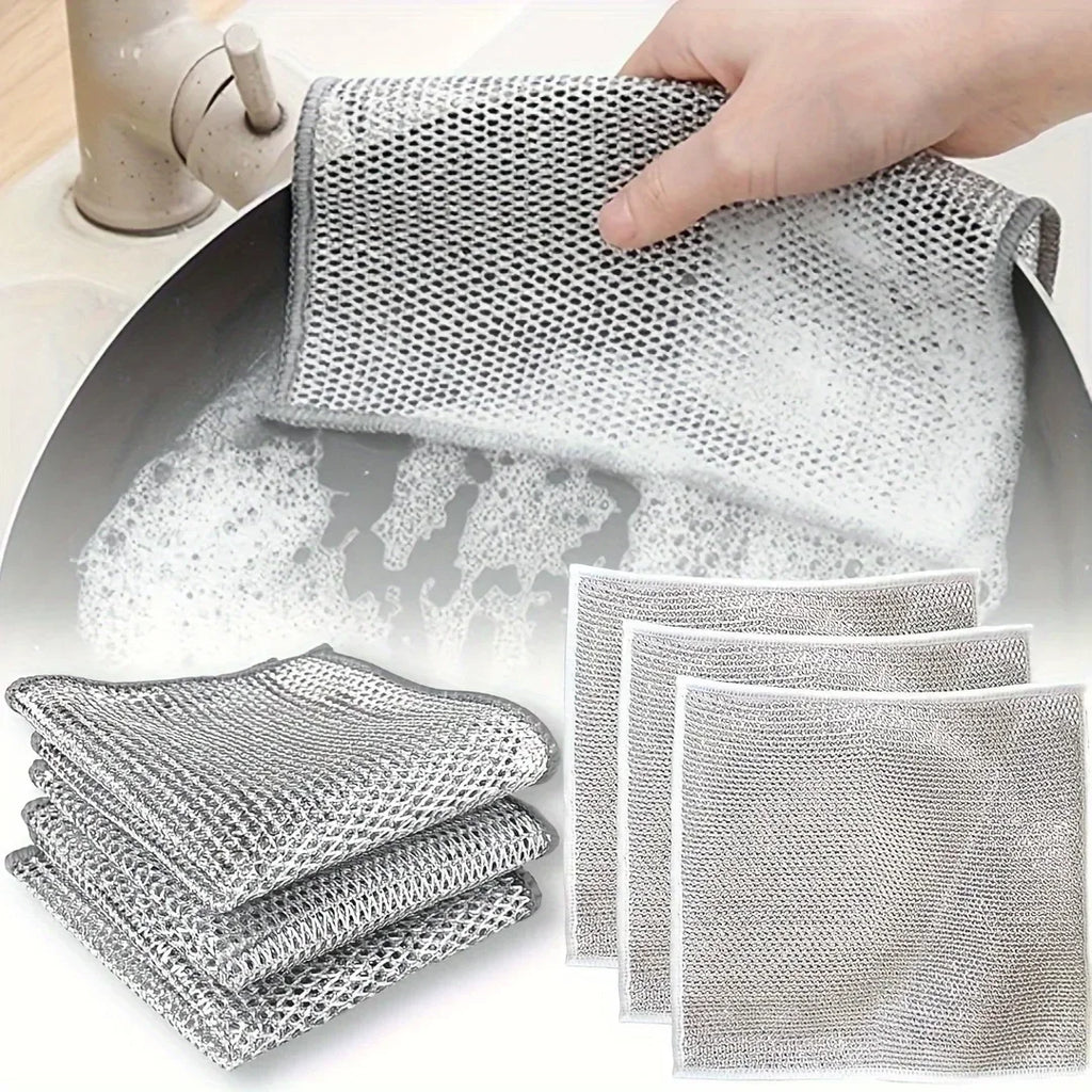 Set of grey non-scratch wire scrubbing cloths with folded pads and an extra square