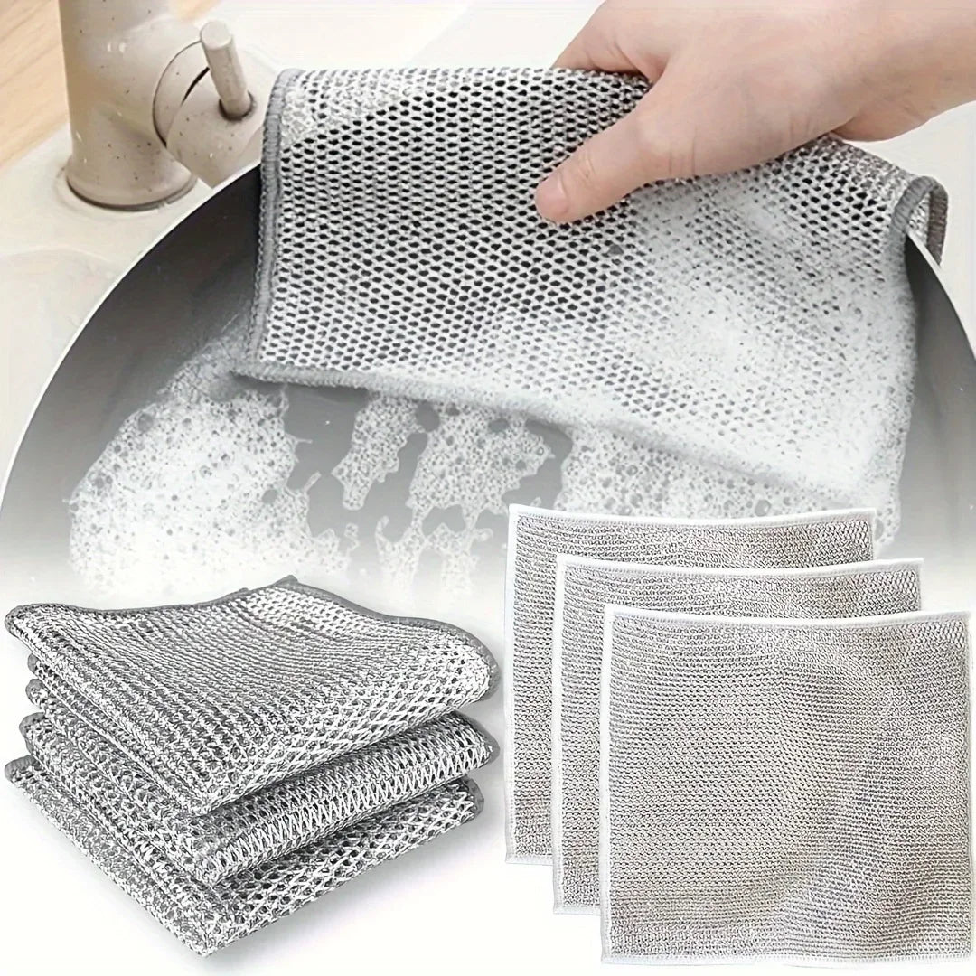Set of grey non-scratch wire scrubbing cloths with folded pads and an extra square