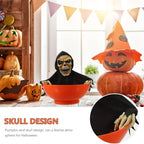 Orange skull bowl haunted prop with hooded skeleton face, hands gripping the rim