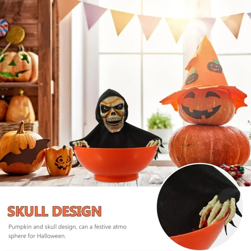 Orange skull bowl haunted prop with hooded skeleton face, hands gripping the rim