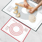 Silicone dough mat with concentric ring guides; pastry dough rounds on top