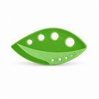 Green 8-hole herb leaf stripper with curved cutting blade and oval shape