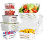 Four clear produce saver storage containers with removable perforated drain baskets