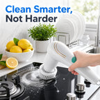 Handheld electric spin scrubber with rotating round brush, held in hand on dark surface