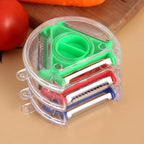 3-in-1 rotary vegetable peeler with interchangeable stainless blades in green housing
