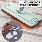 PVC kitchen floor mat with teal surface and textured grip; water/oil-repelling droplet inset.