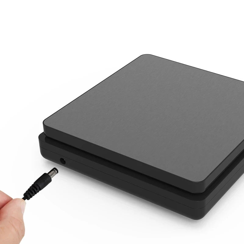 Digital kitchen scale with stainless platform and charging cable connected