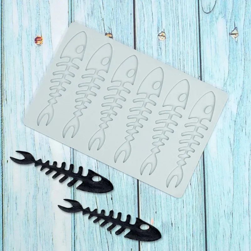 Silicone cake border mold with fish skeleton bone pattern in light gray
