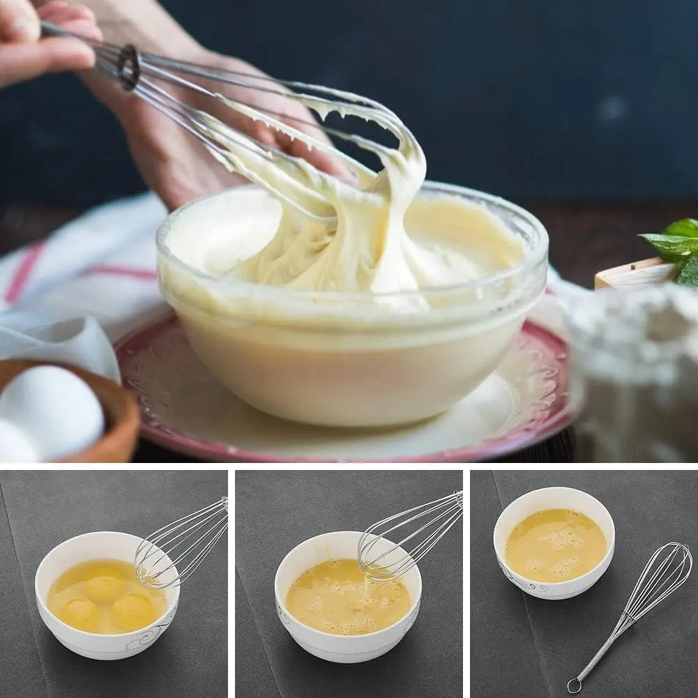 Stainless steel balloon whisk beating thick batter in a bowl, loop handle visible