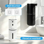 Wall-mounted automatic soap & sanitizer dispenser, white and black beside sink