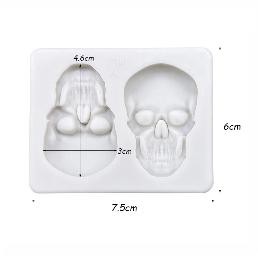 Skull silicone cake mold diagram with two skull cavities and size measurements