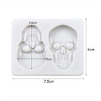 Skull silicone cake mold diagram with two skull cavities and size measurements