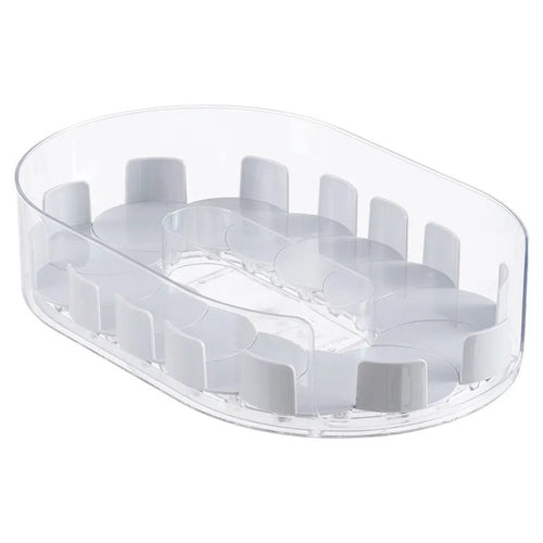 Clear oval rotating turntable base with raised slots for bottles and cans
