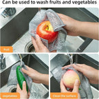 Grey mesh scrubbing cloth used to rinse and clean fruit and vegetables in a sink