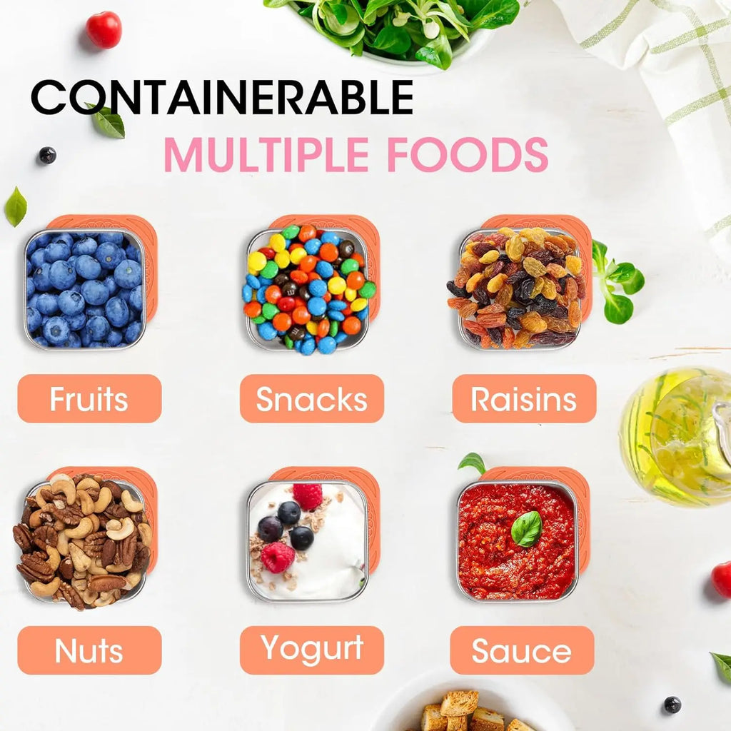 Square stainless snack containers with orange silicone lids, filled with fruits, snacks, and sauce