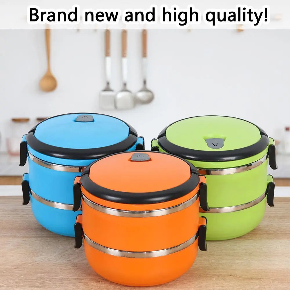 Set of stackable stainless steel bento lunch boxes in blue, green, and orange