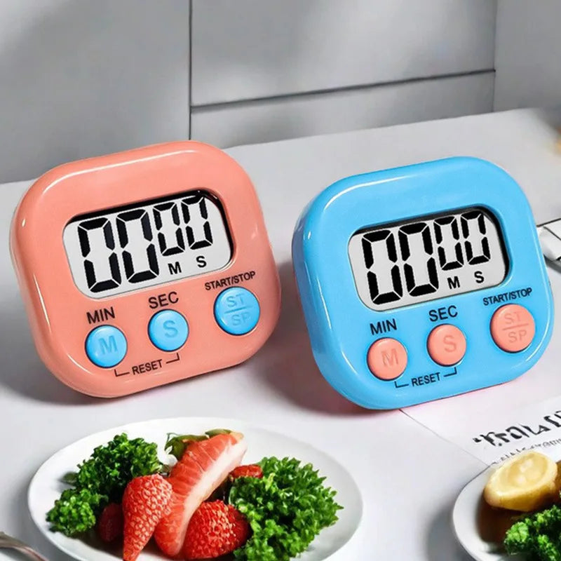 Pink and blue digital kitchen timers with large LCD, MIN/SEC, reset, and start/stop buttons