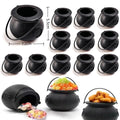 Mini black cauldron candy bowls with handles, shown as a grouped set