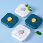 Set of blue and white refrigerator deodorizer boxes with date caps and mint sprigs