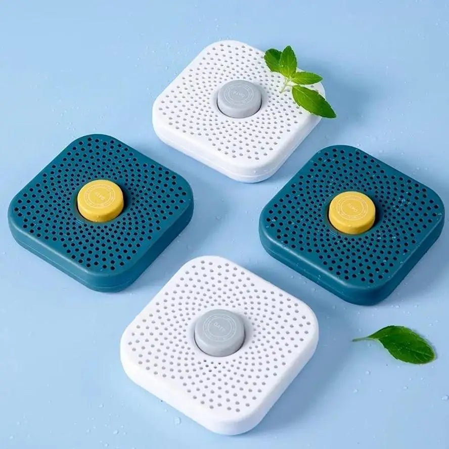 Set of blue and white refrigerator deodorizer boxes with date caps and mint sprigs