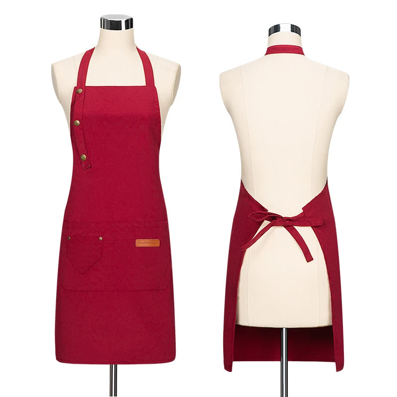 Red canvas chef apron with adjustable neck strap, button front, and front pocket