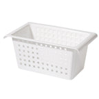 White plastic storage basket with perforated grid sides and side handles, under-sink style