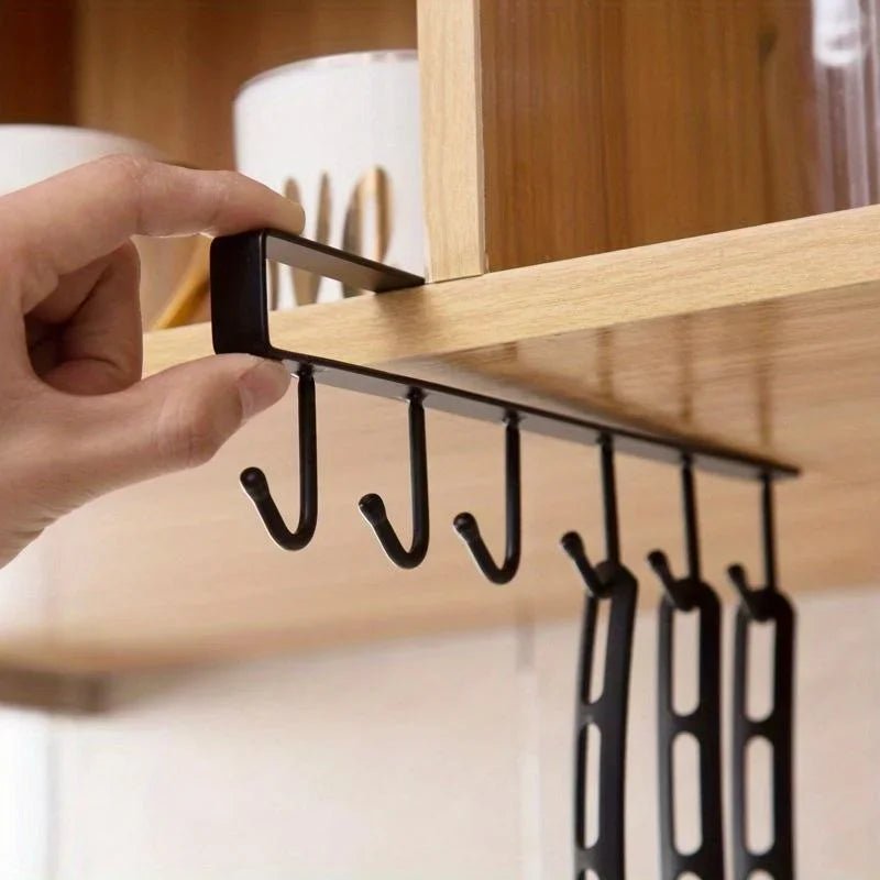 Under-cabinet 6-hook mug hanger in matte black, close-up with slide-on mounting bar