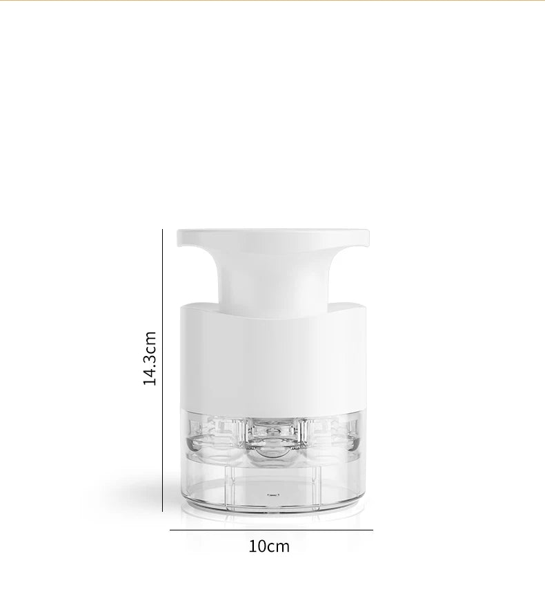 White cherry pitter with clear multi-hole chamber and white press top, front view