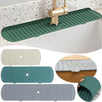 Set of silicone sink splash guards in green, teal, and gray with ridged channels