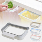 Grey over-cabinet trash bag holder with a translucent yellow bag and green bag opening