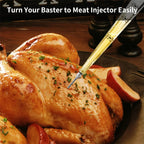 Red-handled meat injector over roasted chicken on a cutting board