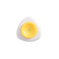 Egg hole puncher tool angled view with white base and yellow circular punch center