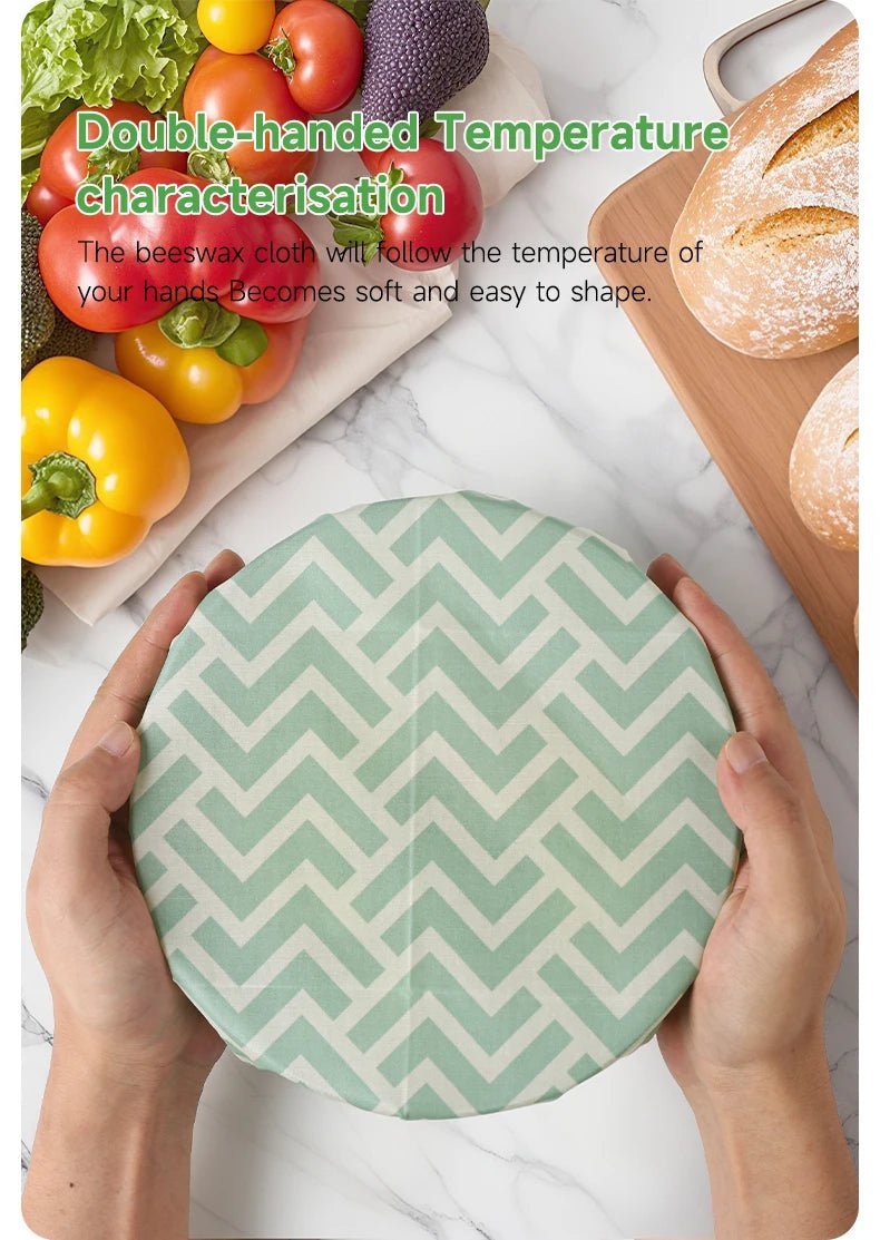 Mint green chevron reusable beeswax food wrap round sheet held by hands